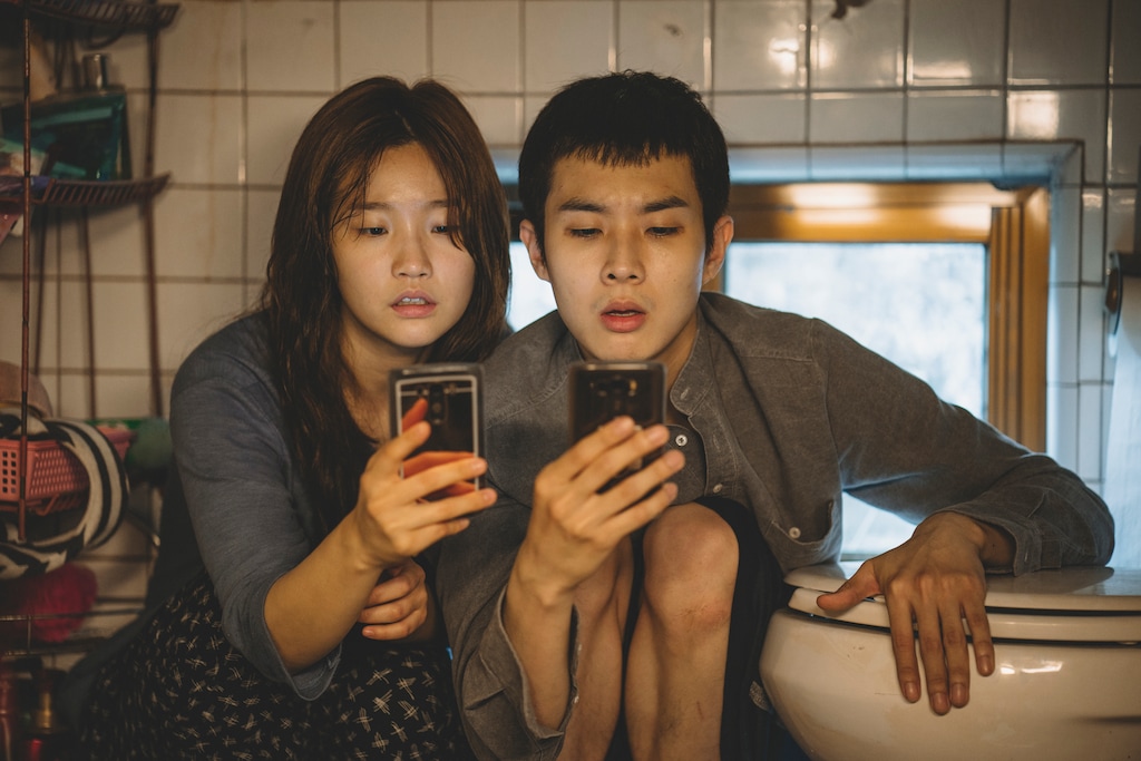 (Photo courtesy of Neon Films) Two siblings (So-dam Park, left, and Woo-sik Choi) go to desperate measures to get a wifi signal, in a scene from Bong Joon Ho's thriller "Parasite." The Utah Film Critics Association voted the South Korean thriller the best movie of 2019.