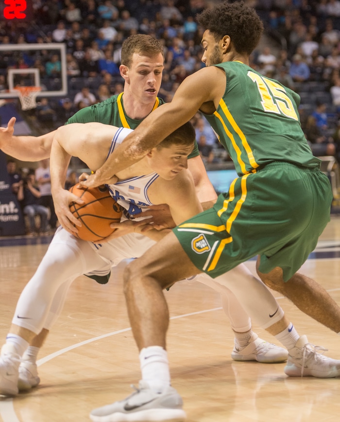 (Rick Egan  |  The Salt Lake Tribune)     Brigham Young Cougars guard McKay Cannon (24) is double-teamed by San Francisco Dons, in basketball action at the Marriott Center, Saturday, February 10, 2018.