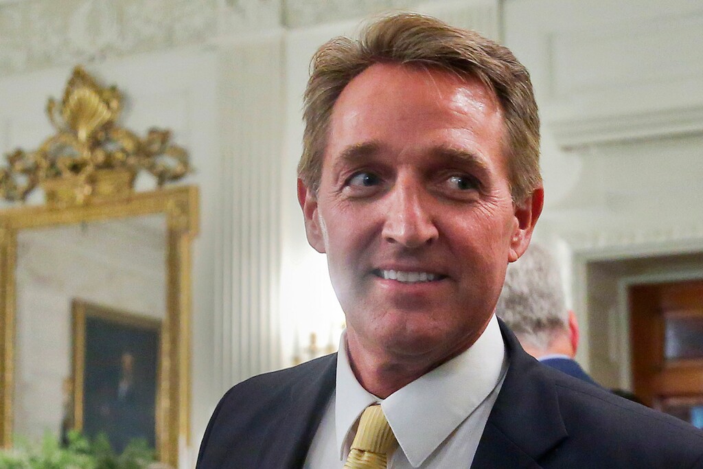 In this photo taken July 19, 2017, Sen. Jeff Flake, R-Ariz. walks to his seat as he attends a luncheon with other GOP Senators and President Donald Trump at the White House in Washington. Flake, a frequent critic of President Donald Trump, announced on Oct. 24, he won’t seek re-election. (AP Photo/Pablo Martinez Monsivais, File)