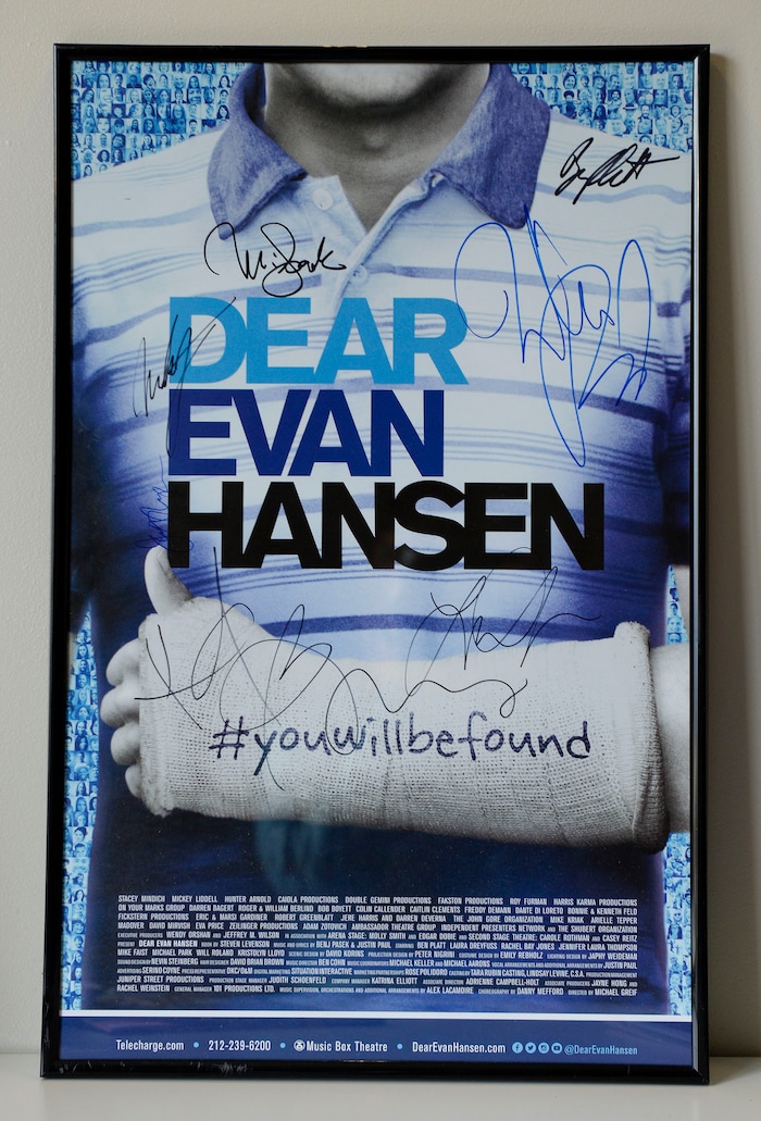 (Leah Hogsten  |  The Salt Lake Tribune) Megan Gutierrez has framed one of the autographed plays she has seen. In 1993, Megan Gutierrez fell in love with the theater after her parents took her to Les Miserables. Since then, Gutierrez has seen countless shows, collected memorabilia from them all and now leads Utah Theater Lovers and Theater Lovers Travel that takes theater lovers like herself across the U.S. and abroad to see the show.