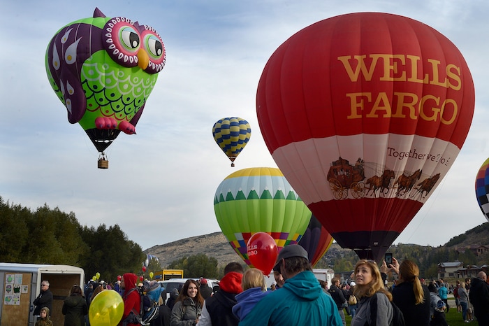 (Scott Sommerdorf | The Salt Lake Tribune)
Balloons, including the "Whoo'z Up" Owl balloon launch at the 4th annual Autumn Aloft Hot Air Balloon Festival in Park City, Sunday, September 17, 2017.