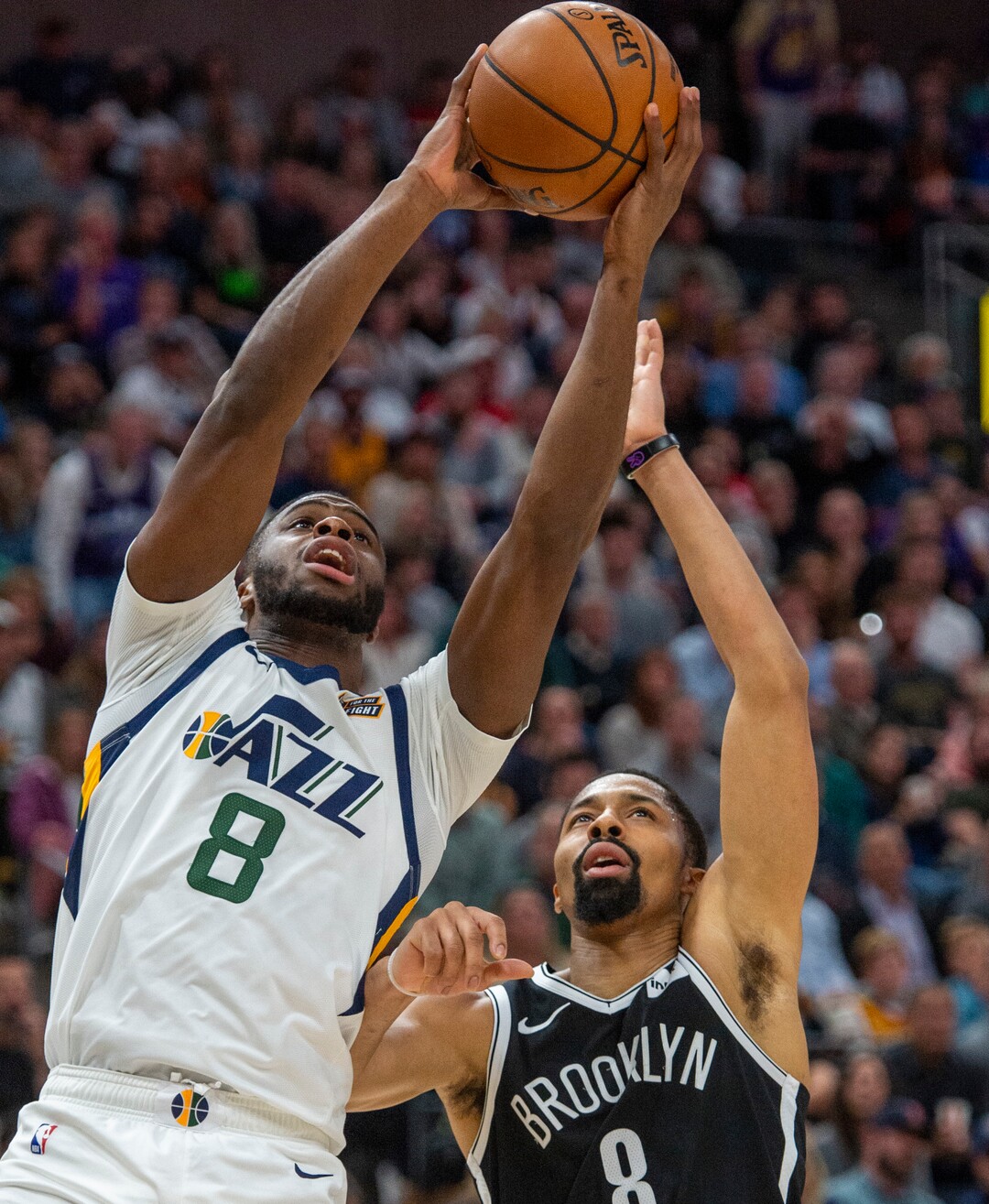 (Rick Egan  |  The Salt Lake Tribune)        Utah Jazz guard Emmanuel Mudiay (8) takes a shot as Brooklyn Nets guard Spencer Dinwiddie (8) defends, in NBA basketball action between the Utah Jazz and the Brooklyn Nets in Salt Lake City, Tuesday, Nov 12, 2019.
