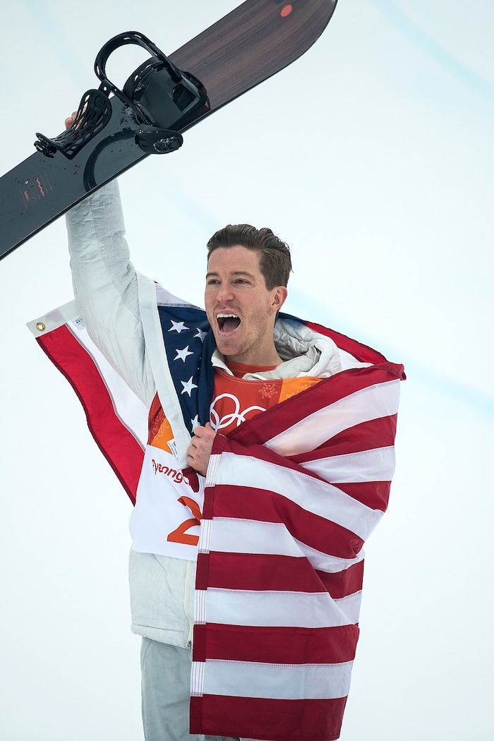 (Chris Detrick  |  The Salt Lake Tribune)  Shaun White celebrates winning gold after his run during the men's halfpipe finals at Phoenix Snow Park during the Pyeongchang 2018 Winter Olympics Wednesday, Feb. 14, 2018.  White won the event with a 97.75, his third Olympic gold medal in the halfpipe (2006, 2010, 2018).