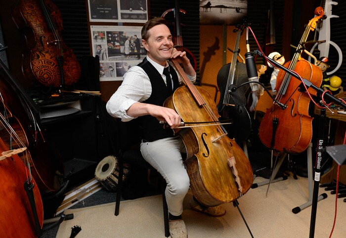 (Francisco Kjolseth | The Salt Lake Tribune) The Piano Guys cellist Steven Sharp Nelson plays one of his instruments in the sound booth of the band's home studio in Sandy.