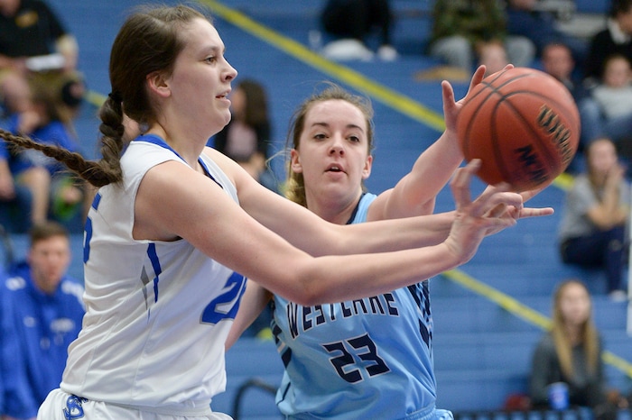 (Leah Hogsten  |  The Salt Lake Tribune)  Westlake's Tatum Peterson (23) knocks the ball from Fremont's Emma Calvert (25). Fremont faces Westlake in their semifinal game of the 6A High School Girls' Basketball Tournament at SLCC in Taylorsville, Friday, Feb. 23, 2018. 