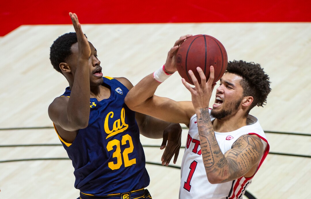 (Rick Egan | The Salt Lake Tribune)  Utah Utes forward Timmy Allen (1) takes the ball do the hoop, as California Golden Bears guard Jalen Celestine (32) defends, in PAC12 Basketball action between the Utah Utes and the California Golden Bears, on Wednesday, Jan. 16, 2021.
