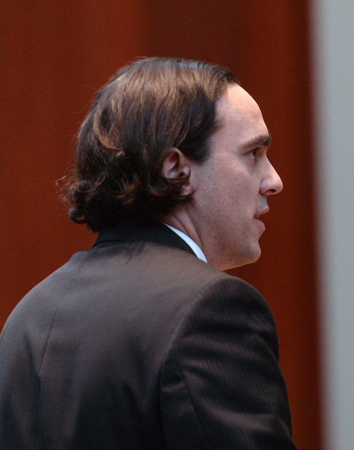 (Al Hartmann  |  The Salt Lake Tribune) 	
Andrew Peterson, assistant solicitor general for the Utah Attorney General's Office argues for the state before the Utah Supreme Court Wednesday Jan. 10. The court heard arguments regarding Anthony Michael Archuleta, 55, who has been on death row since his conviction in 1989 for the Nov. 21, 1988, torture slaying of Gordon Ray Church, a 28-year-old Southern Utah State College theater student, at a remote location in Millard County. In separate trials, Archuleta and co-defendant Lance Conway Wood each were convicted of capital murder. Wood was sentenced to life in prison. Archuleta was sentenced to death. 

