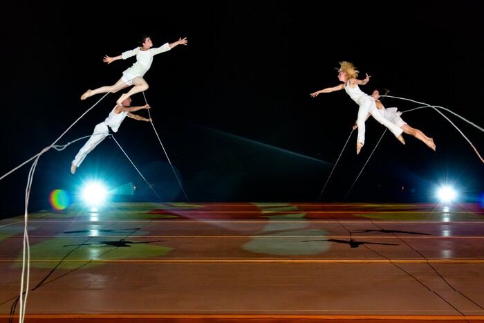 (Photo courtesy of Jim Stone) Oakland, Calif.-based “vertical dance” company BANDALOOP performs at the San Francisco Public Canvas event. BANDALOOP will be appearing at the Utah Arts Festival June 21-24, and will perform twice daily (5:30 and 7 p.m.) on the six-story library glass wall above the reflecting pool.