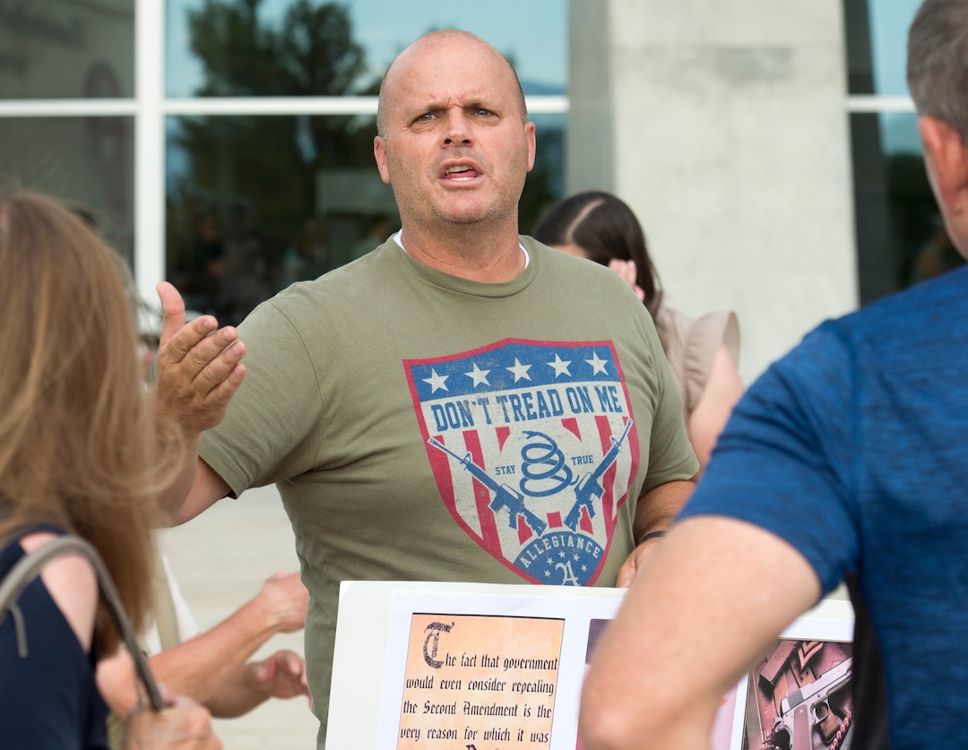 (Rick Egan  |  The Salt Lake Tribune)   Kish North from South Jordan, argues against gun control, before a town hall meeting in Sandy, where survivors from the Florida school shooting held a forum with Utah students involved with the March for Our Lives movement, Saturday, July 14, 2018.