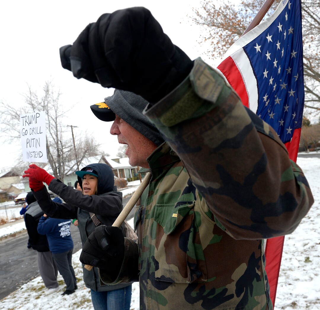 (Al Hartmann  |  The Salt Lake Tribune) 	Crowds protest President Donald Trump outside LDS Welfare Square at 700 S. 800 W. as he tours the facility with church leaders Monday Dec 4. 