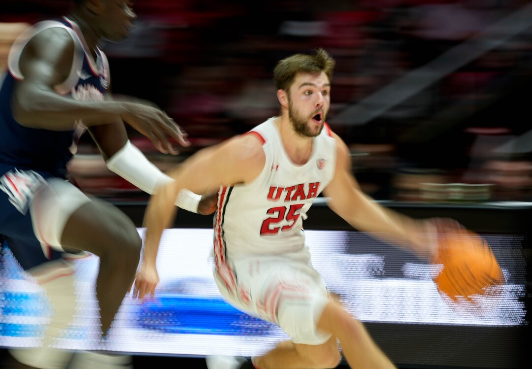 (Francisco Kjolseth | The Salt Lake Tribune) Utah Utes guard Rollie Worster (25) advances the ball as the University of Utah hosts the Arizona Wildcats in NCAA basketball in Salt Lake City on Thursday, Dec. 1, 2022.