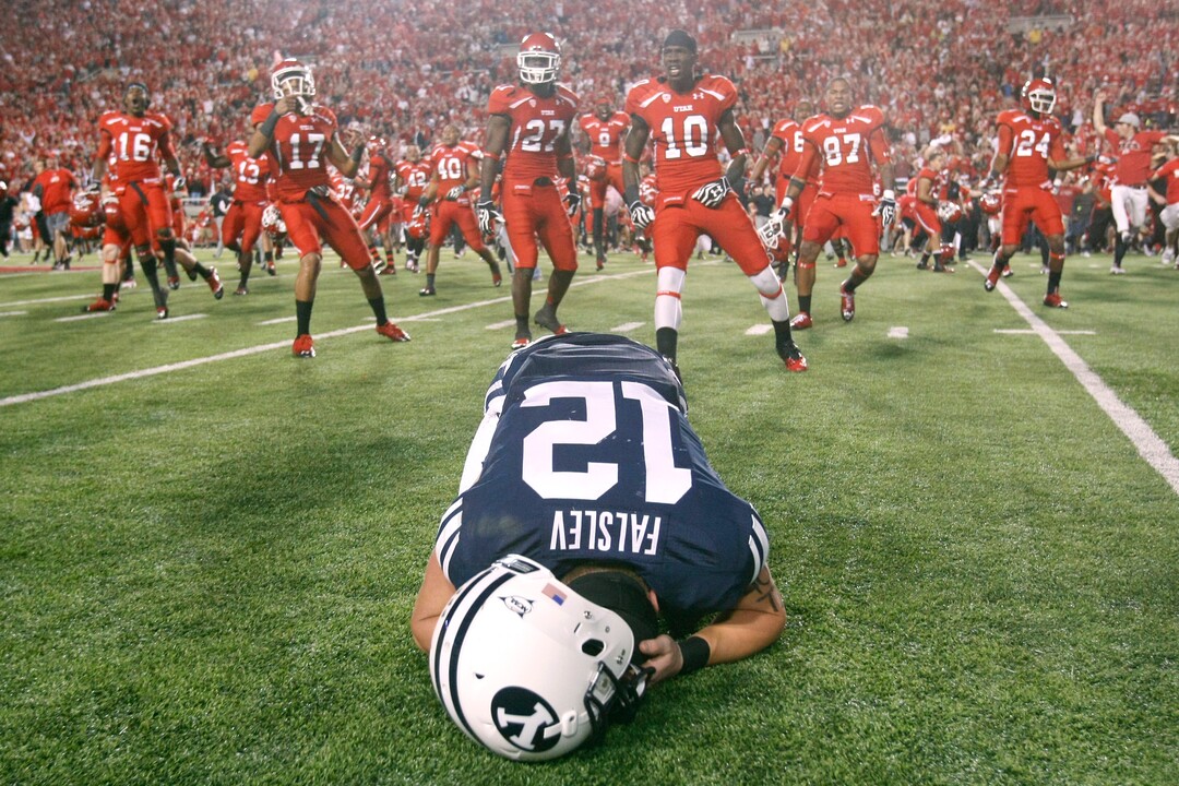 (Chris Detrick | Tribune file photo) Brigham Young Cougars wide receiver JD Falslev (12) collapses on the field after a potential game-tying field goal is missed at Rice-Eccles Stadium on Saturday, Sept. 15, 2012.  Utah won the game 24-21.
