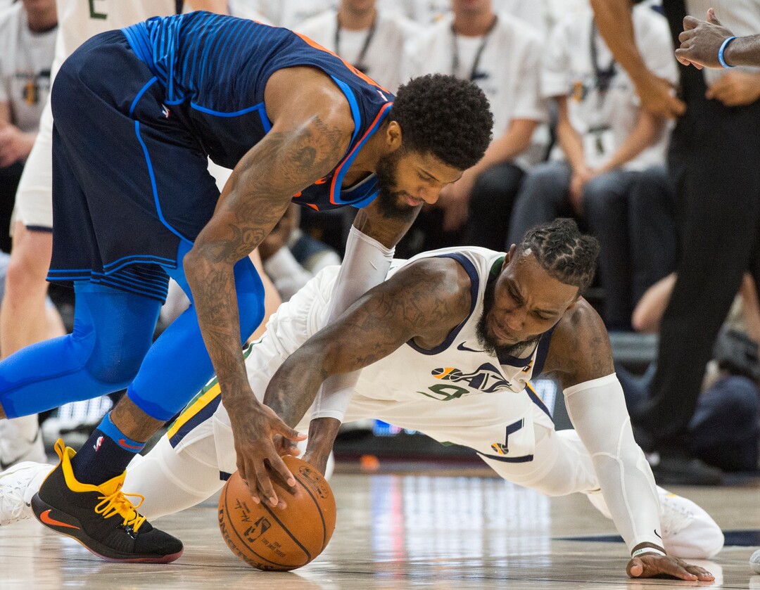 (Rick Egan  |  The Salt Lake Tribune)    Oklahoma City Thunder forward Paul George (13) goes for a loose ball along with Utah Jazz forward Jae Crowder (99), in game 4, NBA playoff action between Utah Jazz and Oklahoma City Thunder, in Salt Lake City, Monday April 23, 2018.