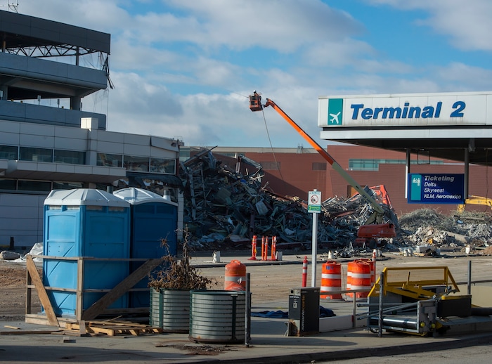(Rick Egan | The Salt Lake Tribune)  Crews work on the demolition of the old parking garage at the Salt Lake International Airport, to make way for the expansion of the new terminals, on  Tuesday, Nov. 24, 2020.