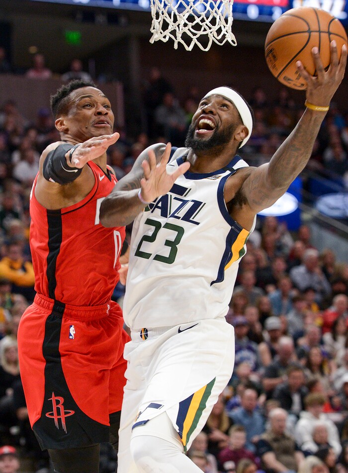 (Leah Hogsten  |  The Salt Lake Tribune) Utah Jazz forward Royce O'Neale (23) battles Houston Rockets guard Russell Westbrook (0) for two.  The Utah Jazz host the Houston Rockets at Vivint Arena, Feb. 22, 2020.