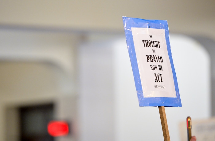 (Chris Samuels | The Salt Lake Tribune) Marchers hold signs and chant in support of increased gun safety measures at the Capitol in Salt Lake City, Saturday, June 11, 2022.