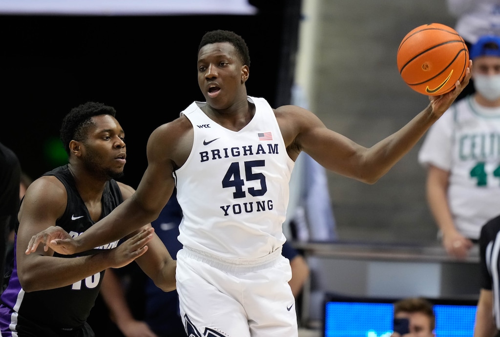 (Francisco Kjolseth | The Salt Lake Tribune) Brigham Young Cougars forward Fousseyni Traore (45) looks for a teammate in WCC basketball action between the Brigham Young Cougars and the Portland Pilots, at the Marriott Center, on Saturday, January 22, 2022.
