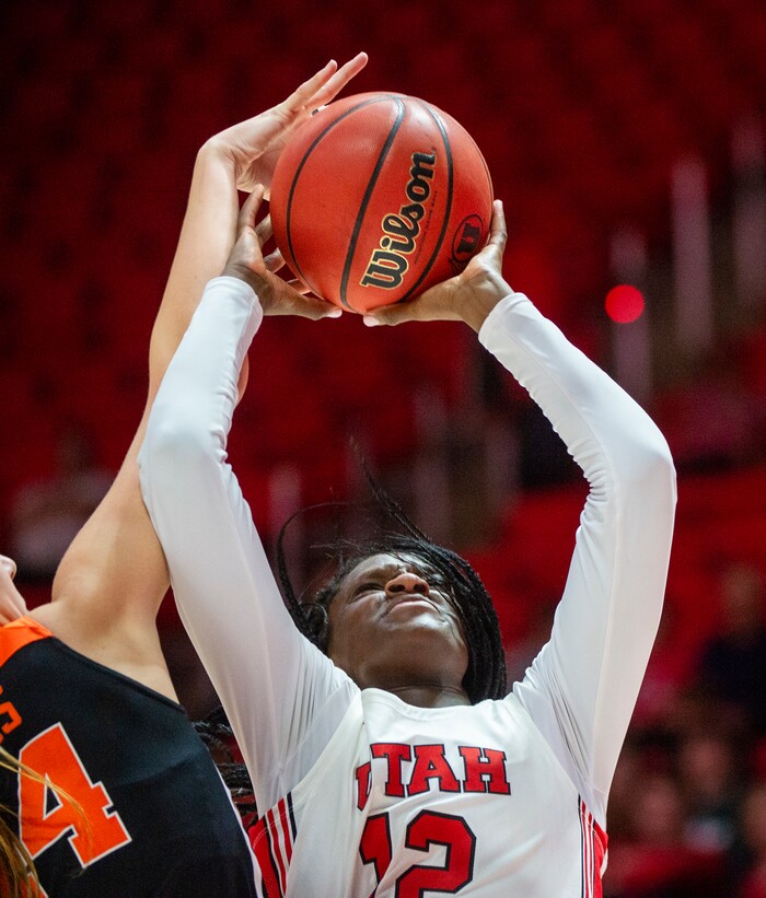 (Rick Egan  |  The Salt Lake Tribune)     Utah Utes forward Lola Pendande (12) take s ascot as Oregon State Beavers forward Taylor Jones (44) defends, in PAC-12 basketball action between the Utah Utes and the Oregon State Beavers at the Jon M. Huntsman Center, Saturday, Feb. 1, 2020.