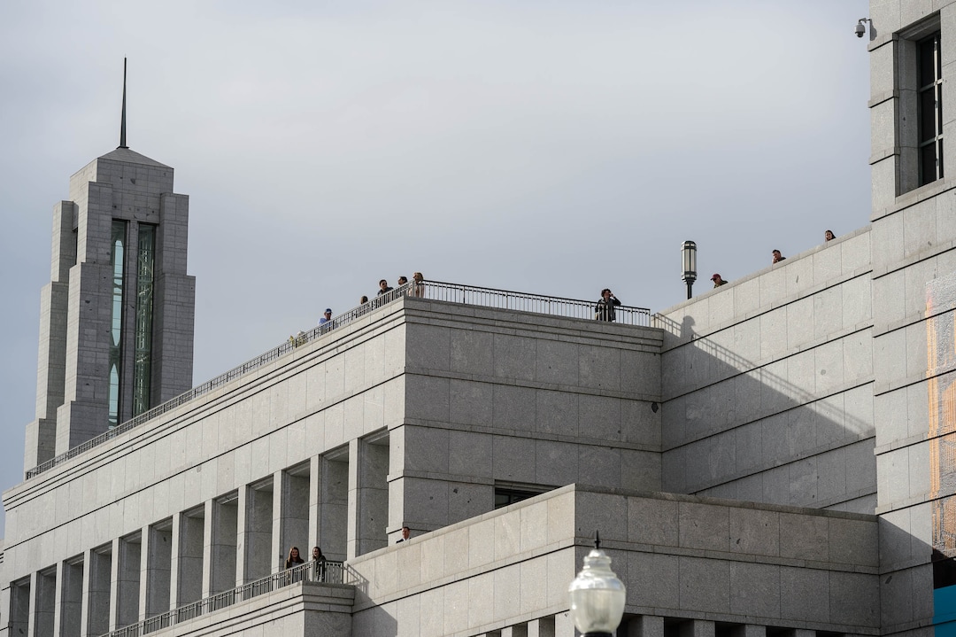 (Trent Nelson  |  The Salt Lake Tribune) Onlookers at a rally about BYU's changing position on “romantic behavior” by same-sex couples, in Salt Lake City on Friday, March 6, 2020.