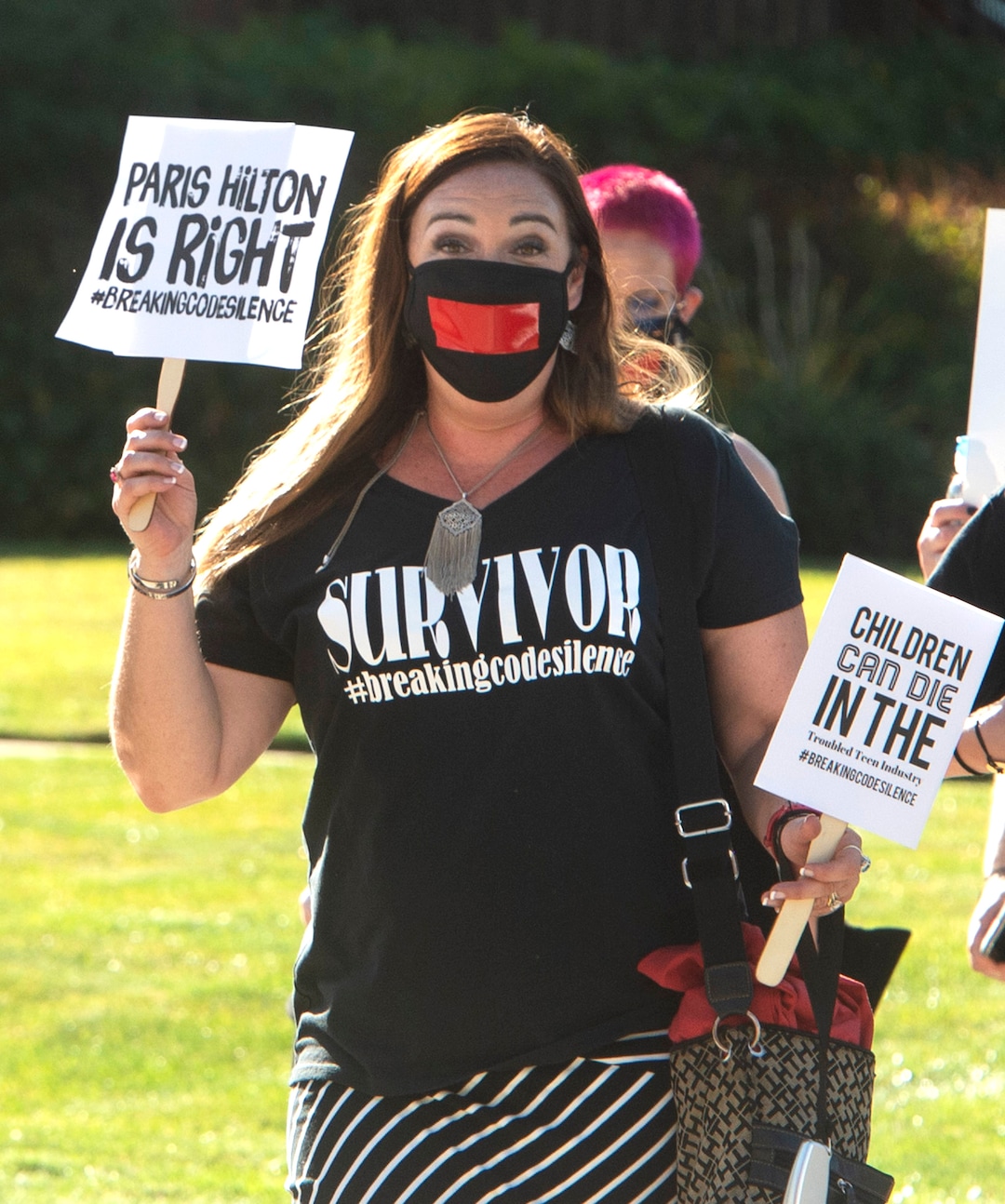 (Rick Egan  |  The Salt Lake Tribune)    Alexis Frevzza fro Austin Tx, joins a march to the Provo Canyon School, during a rally calling for the closure of Provo Canyon School, a residential treatment center in Utah she attended when she was a teen, on Friday, Oct. 9, 2020.