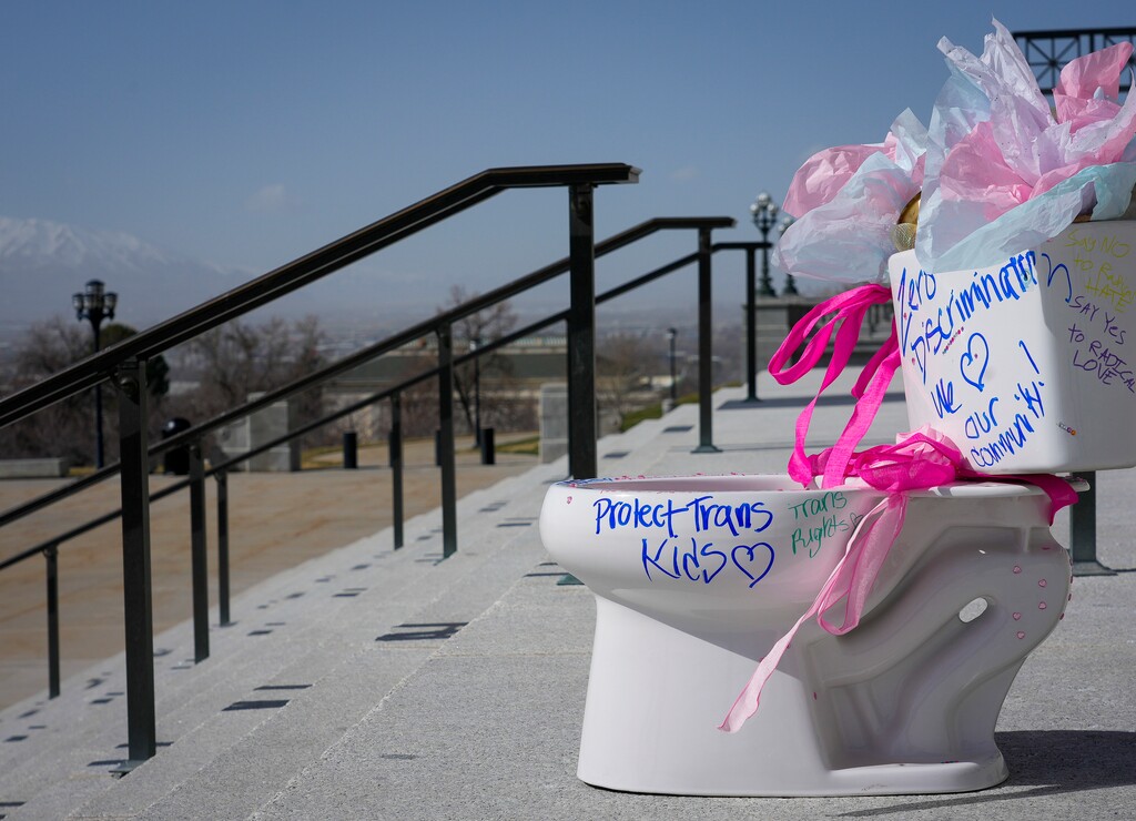 (Bethany Baker  |  The Salt Lake Tribune) Messages in support of transgender rights cover a toilet bowl during a demostration by Utah Students Unite in opposition of HB257 on the steps of the Utah Capitol in Salt Lake City on Friday, March 1, 2024.