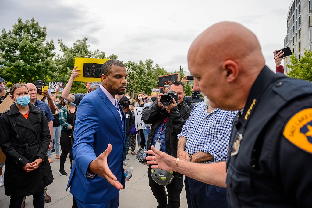 (Trent Nelson  |  The Salt Lake Tribune) Kamaal S. Ahmad shakes hands with Salt Lake City Police Chief Mike Brown following a rally in Salt Lake City on Saturday, June 6, 2020.