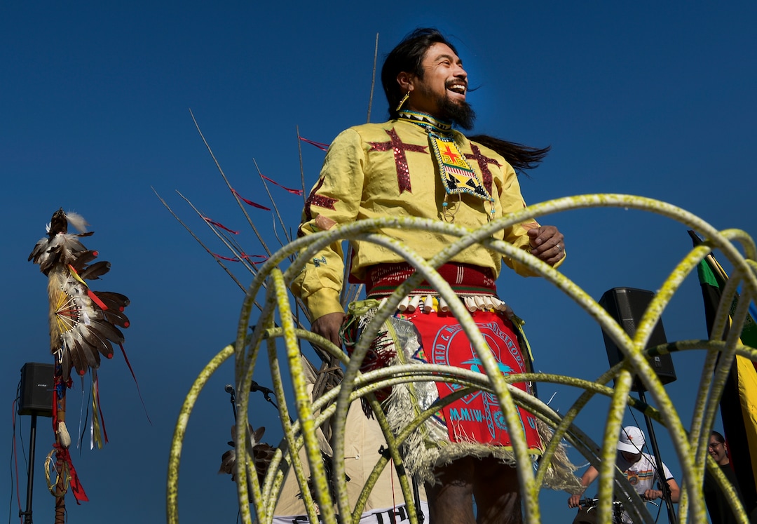 Leah Hogsten  |  The Salt Lake Tribune  Carl Moore, a Hopi and Chemehuevi Native American performs a hoop dance in honor of Mother Earth. Moore also made offerings, sang and gave a prayer during the May Day celebration. The "Stop the Polluting Port" community coalition staged a May Day celebration, calling for respect and awareness of the water, earth and air regarding the 20,000 acres west of Salt Lake City where the inland port industrial site has been proposed.