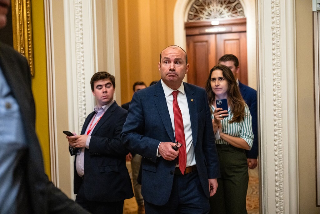(Eric Lee | The New York Times) Sen. Mike Lee, R-Utah, talks with reporters at the U.S. Capitol in Washington, on Tuesday, June 17, 2025. They love hunting, fishing and conservatism. And they hate a plan by a conservative senator to sell millions of acres of public lands.