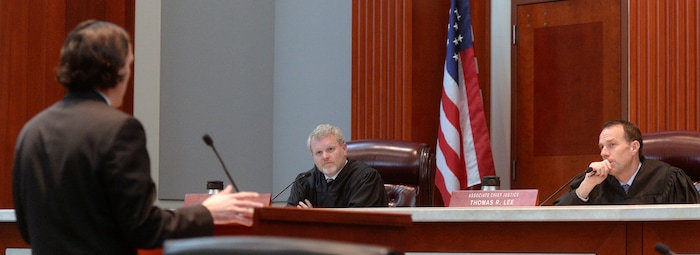 (Al Hartmann  |  The Salt Lake Tribune) 	
Andrew Peterson, assistant solicitor general for the Utah Attorney General's Office, left, argues for the state before the Utah Supreme Court Wednesday Jan. 10. The court heard arguments regarding Anthony Michael Archuleta, 55, who has been on death row since his conviction in 1989 for the Nov. 21, 1988, torture slaying of Gordon Ray Church, a 28-year-old Southern Utah State College theater student, at a remote location in Millard County. In separate trials, Archuleta and co-defendant Lance Conway Wood each were convicted of capital murder. Wood was sentenced to life in prison. Archuleta was sentenced to death. 

