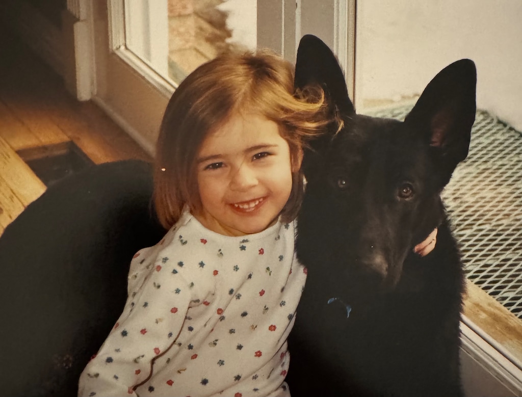 (Gordon Monson) Gordon Monson's daughter Taylor with the family's beloved dog, Kiu.