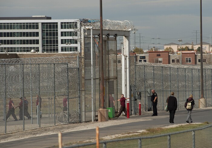 (Leah Hogsten  |  The Salt Lake Tribune) As she slips back into the prison yard after working a shift at the cafe, Chonsey Leslie waves goodbye to her two supervisors. Every Monday through Friday, a half-dozen or so Level 4 inmates file out of the Olympus Facility at the Utah State Prison to cook, bake and serve the public at the Serving Time Caf. The operation is part of Utah Department of Corrections Industries (UCI) and is aimed at helping inmates return to society.