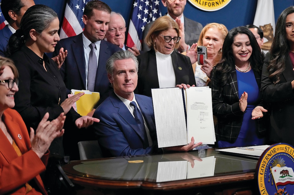 (Godofredo A. Vásquez | AP) California Gov. Gavin Newsom signs legislation calling for a special election on a redrawn congressional map on Thursday, Aug. 21, 2025, in Sacramento, Calif.