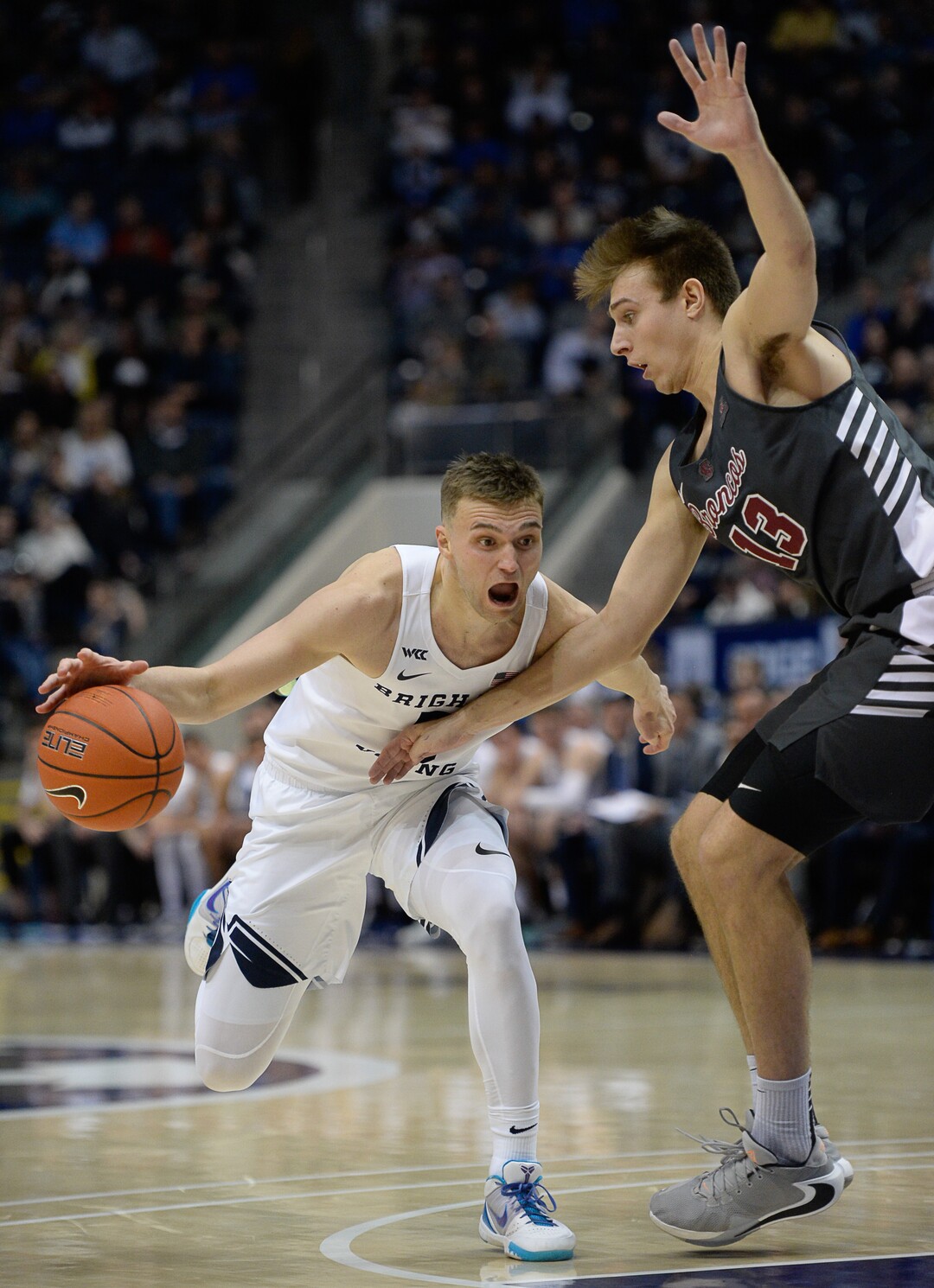 (Francisco Kjolseth  |  The Salt Lake Tribune) Brigham Young Cougars guard Jake Toolson (5) drives the ball against Santa Clara Broncos forward Keshawn Justice (14) in the first half as the Brigham Young Cougars host the Santa Clara Broncos at the Marriott Center in Provo, Thursday, Feb. 20, 2020.
