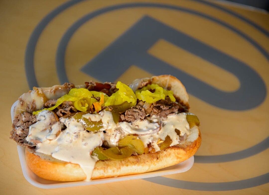 (Trent Nelson | The Salt Lake Tribune)  Cheesesteak with provolone, mushrooms, onions, peppers, and spicy mayo on top. Fat Boy Phillies, a popular new sandwich shop in Murray, Monday July 23, 2018.