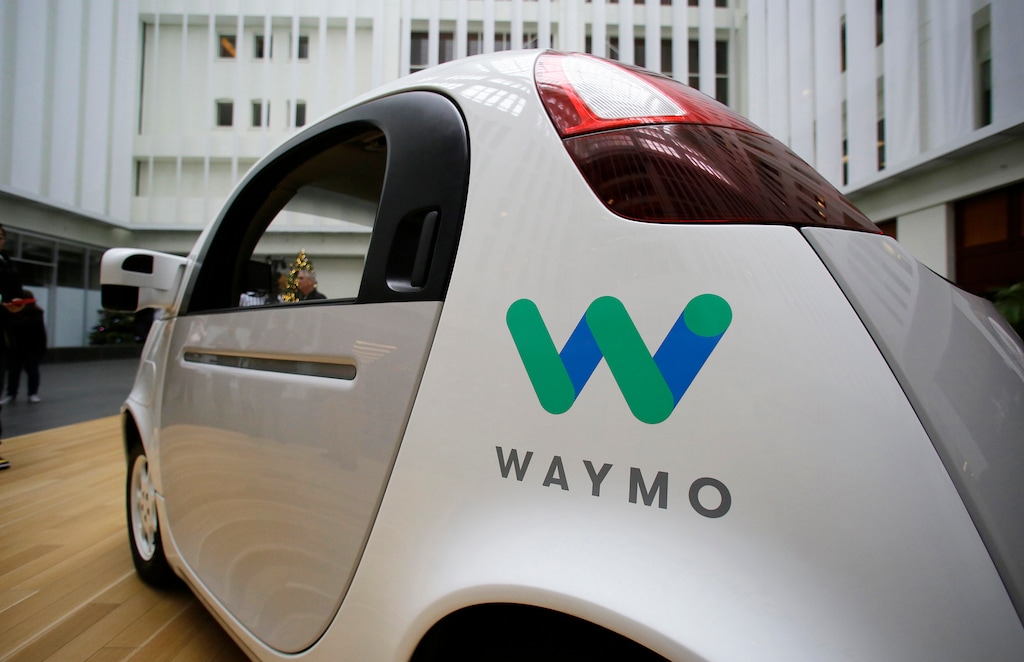 FILE - In this Dec. 13, 2016, file photo, the Waymo driverless car is displayed during a Google event in San Francisco. Uber is settling a lawsuit filed by Google’s autonomous car unit alleging that the ride-hailing service ripped off self-driving car technology. Both sides in the case issued statements confirming the settlement Friday, Feb. 9, 2018, morning in the midst of a federal court trial in the case. (AP Photo/Eric Risberg, File)