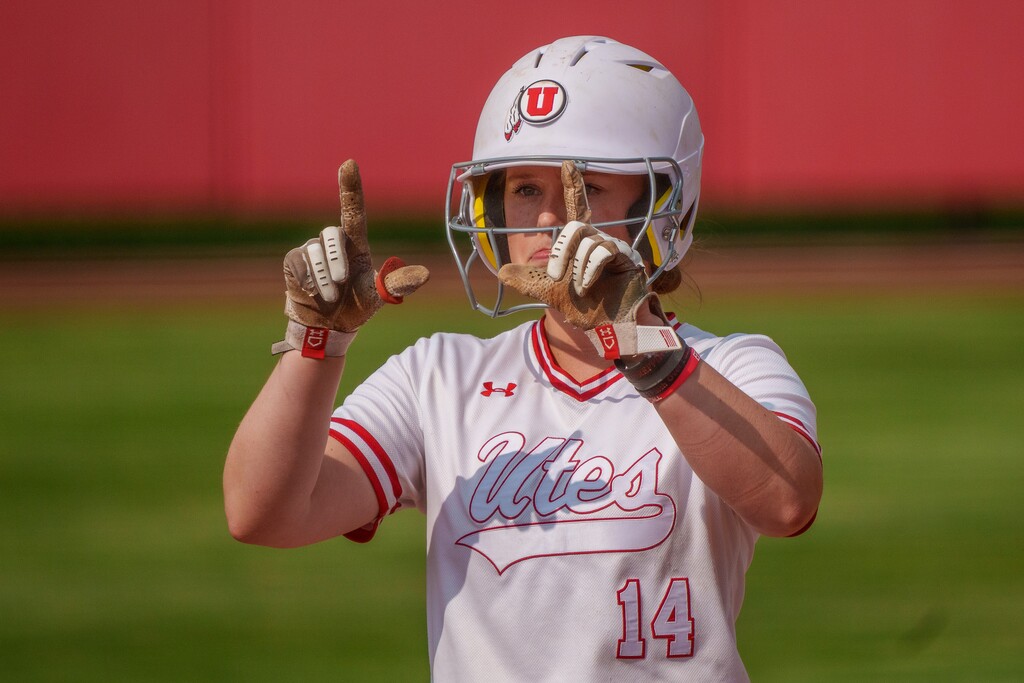 (Trent Nelson  |  The Salt Lake Tribune) Utah infielder Karlie Davison (14) celebrates two RBIs in the sixth inning as Utah's softball team faces Southern Illinois in the NCAA Tournament in Salt Lake City on Friday, May 19, 2023.