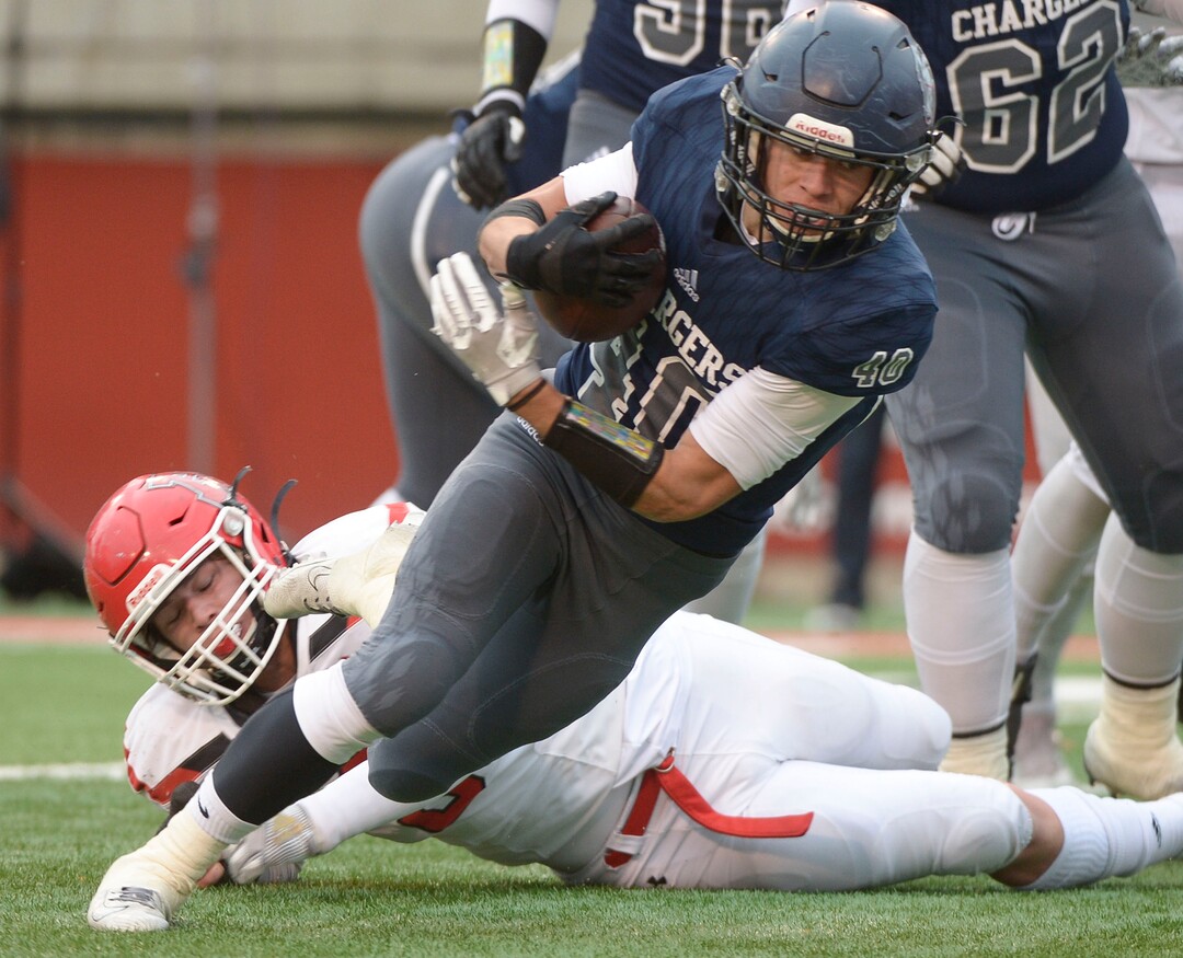 (Leah Hogsten  |  The Salt Lake Tribune)  Corner CanyonÕs Dylan Simons runs for a first down. Corner Canyon High School takes on American Fork High School during the 6A State Championship football title, Nov. 22, 2019 at Rice-Eccles Stadium.