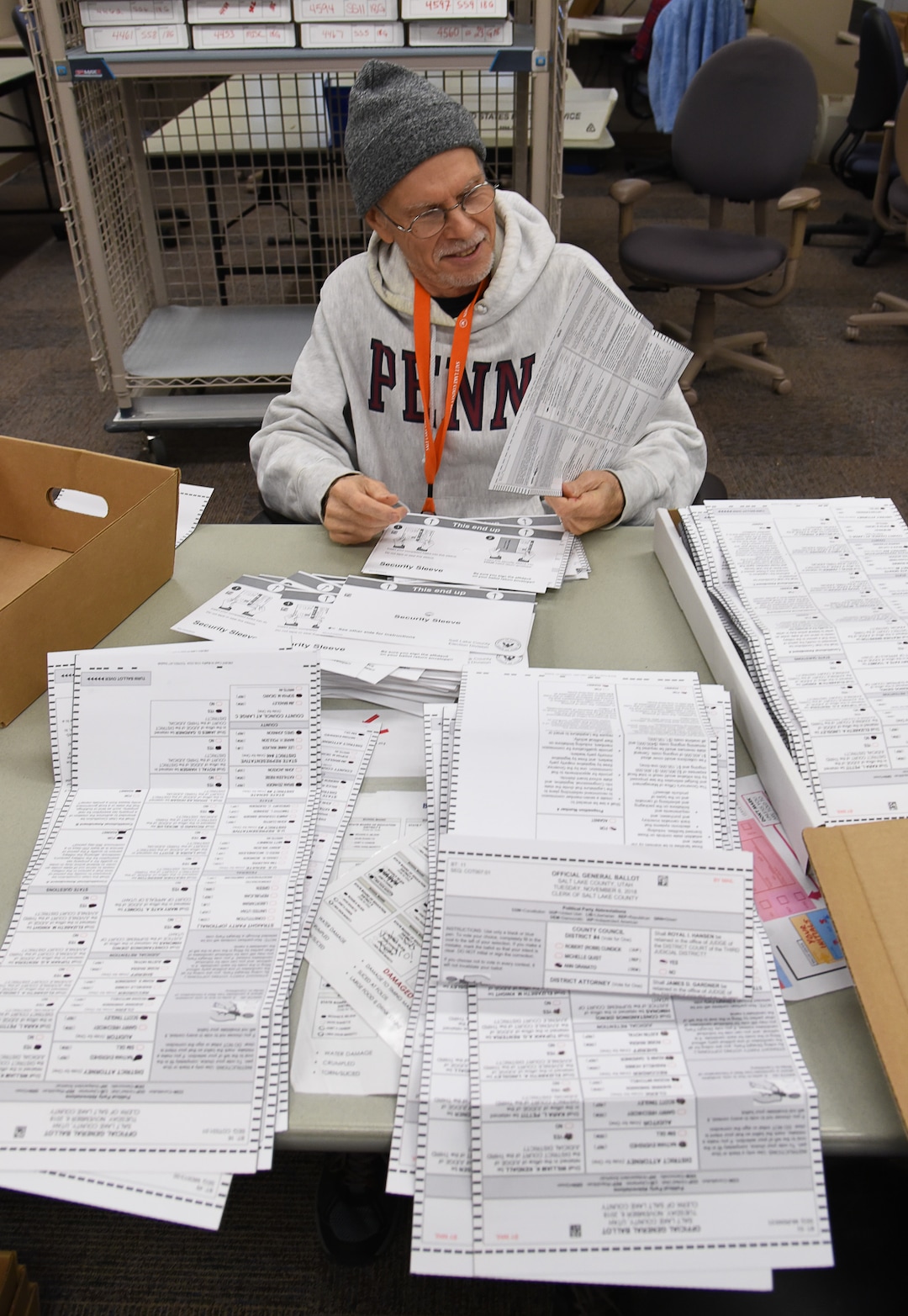 (Francisco Kjolseth  |  The Salt Lake Tribune)  Allan Post, a temporary elections worker checks for any problems with mailed in ballots at the City and County Ballot Center on Tuesday, Oct. 30, 2018. Turnout numbers from the State Elections Office showed 359,219 people out of 1,390,679 active Utah voters have already cast their ballots as of Tuesday morning. Ten Salt Lake County early voting locations will open on Wednesday, but 1,059 voters have already taken advantage of voting at the Salt Lake County government offices. While many have already cast their ballots, there are some Utahns who haven't received theirs in the mail yet, which may create obstacles for them to vote.
