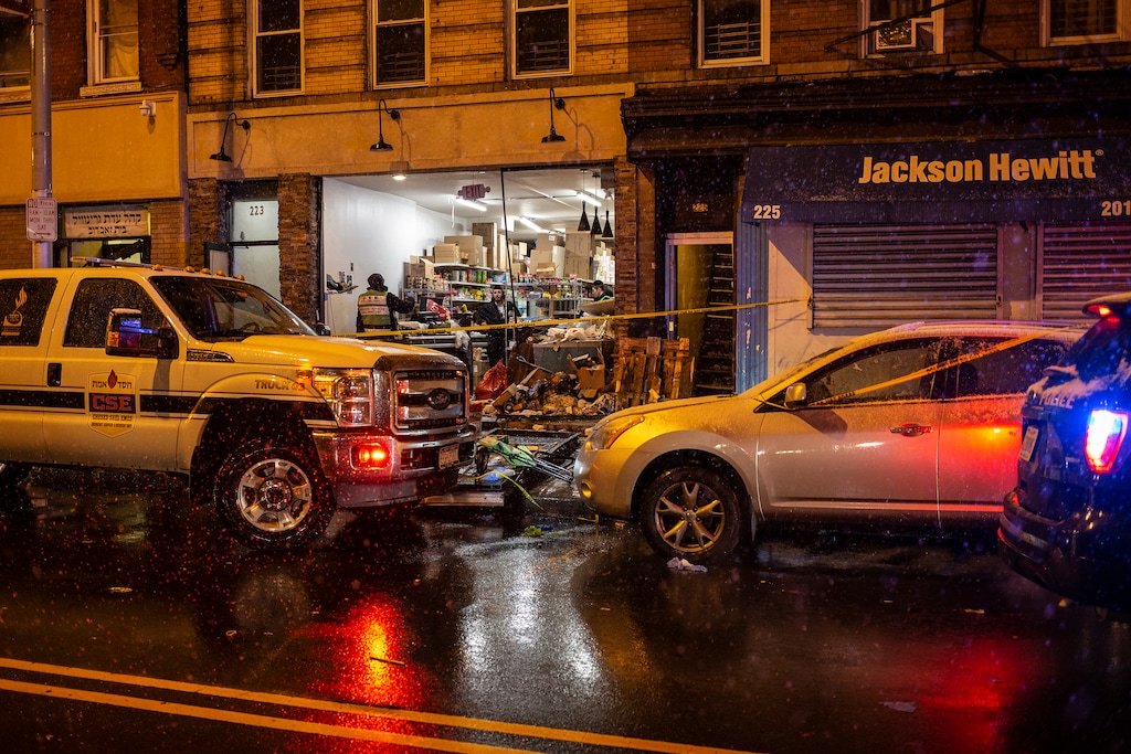 (Bryan Anselm | The New York Times) Members of a Jewish Orthodox emergency response and recovery team search for remains on Wednesday, Nov. 11, 2019, to ensure for proper burial of victims of a gunfight at a kosher market in Jersey City, N.J. The firefight on Tuesday that left six people dead is believed to have been motivated by anti-Semitic and anti-police sentiments, an official said.