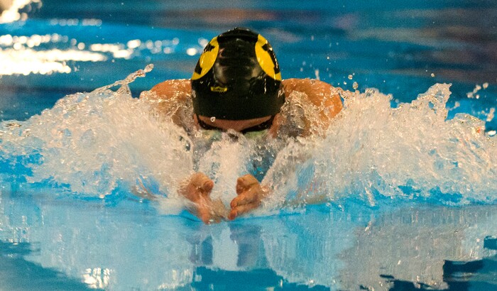 (Rick Egan  |  The Salt Lake Tribune)    Kearns Swimmer, Lily Plaudis, places first in the Women's 100 Yard Breaststroke, in 6A State Swimming Championships in Bountiful, Friday, February 9, 2018.