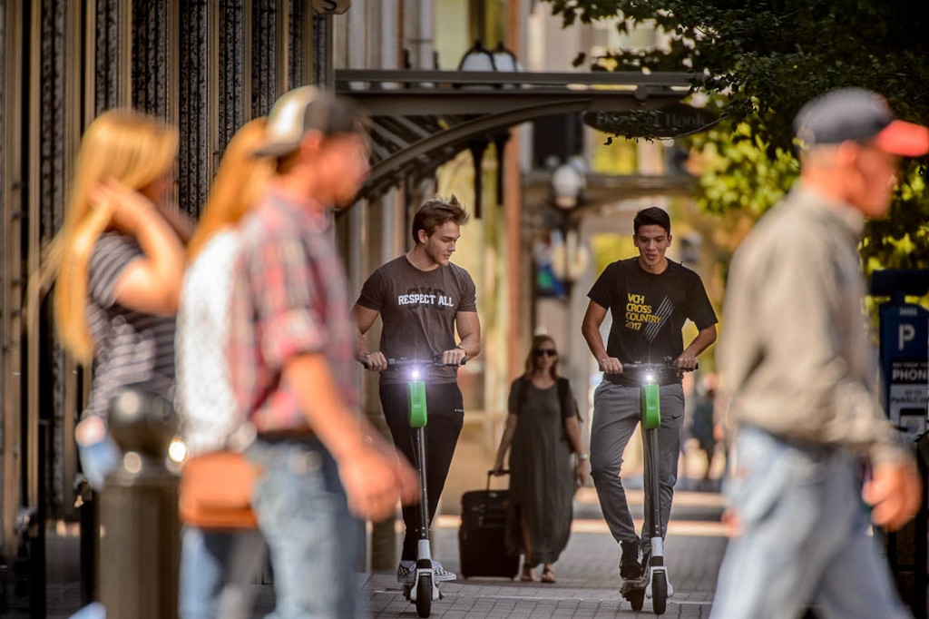 (Trent Nelson | Tribune file photo) Scooters on sidewalkshave become a common sight in downtown Salt Lake City, Sept. 10, 2018, and city officials warn that it may have to begin cracking down on the issue, which has generated lots of complaints and more than a few injuries.