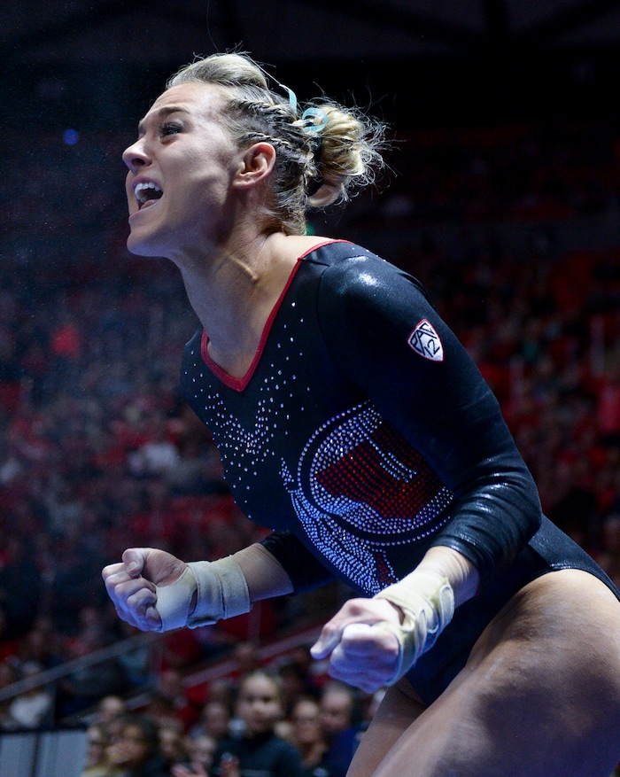 (Leah Hogsten  |  The Salt Lake Tribune) Tiffani Lewis celebrates her vault routine as the No. 4 Utah gymnasts host No. 20 Georgia in the final regular season meet at Jon M Huntsman Center in Salt Lake City Friday, March 16, 2018. 