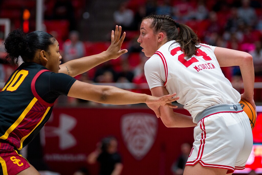 (Trent Nelson | The Salt Lake Tribune) Utah Utes guard Kennady McQueen (24) defended by USC Trojans guard Malia Samuels (10) as Utah hosts USC, NCAA basketball in Salt Lake City on Friday, Jan. 19, 2024.