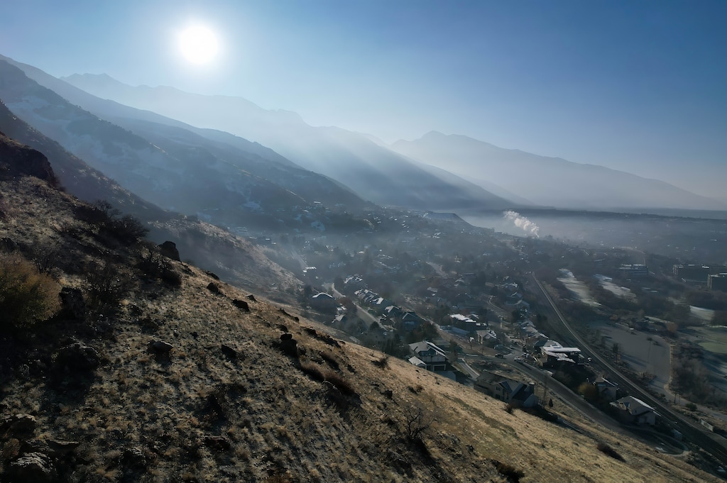 (Francisco Kjolseth | The Salt Lake Tribune) Inversion conditions in the Salt Lake valley trap small particle pollutants in December 2024. Officials say a new clean energy deal embraced by the Salt Lake City Council will help improve air quality across Utah.