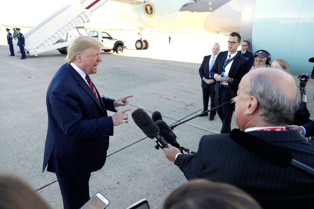 (Evan Vucci | AP) President Donald Trump talks to reporters before boarding Air Force One for a trip to Chicago to attend the International Association of Chiefs of Police Annual Conference and Exposition, Monday, Oct. 28, 2019, in Andrews Air Force Base, Md.