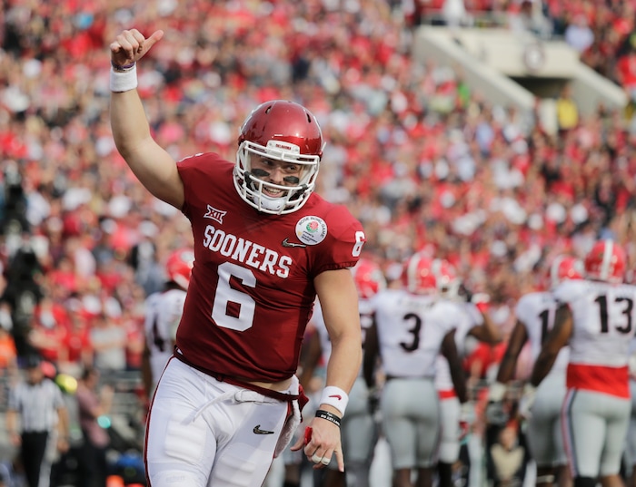 Oklahoma quarterback Baker Mayfield celebrates after running back Rodney Anderson scored a touchdown against Georgia during the first half of the Rose Bowl NCAA college football game Monday, Jan. 1, 2018, in Pasadena, Calif. (AP Photo/Jae C. Hong)