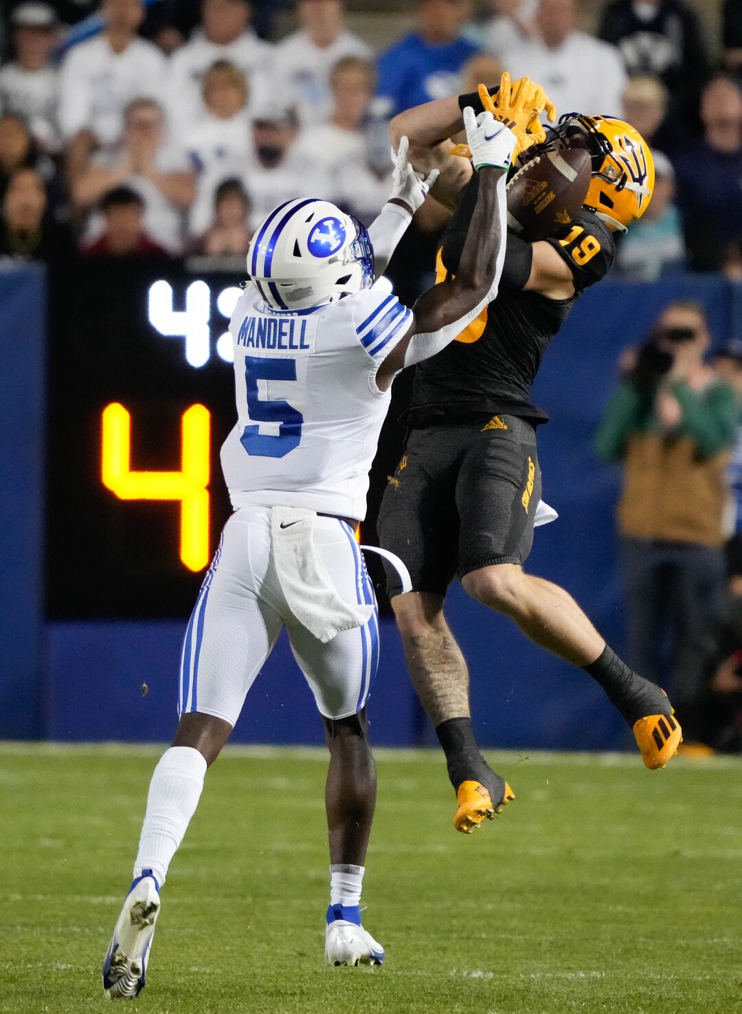 (Francisco Kjolseth | The Salt Lake Tribune) Brigham Young Cougars defensive back D'Angelo Mandell (5) breaks up a pass intended for Arizona State Sun Devils wide receiver Ricky Pearsall (19) in football action between the Brigham Young Cougars and the Arizona State Sun Devils at LaVell Edwards Stadium in Provo, on Saturday, Sept. 18, 2021.