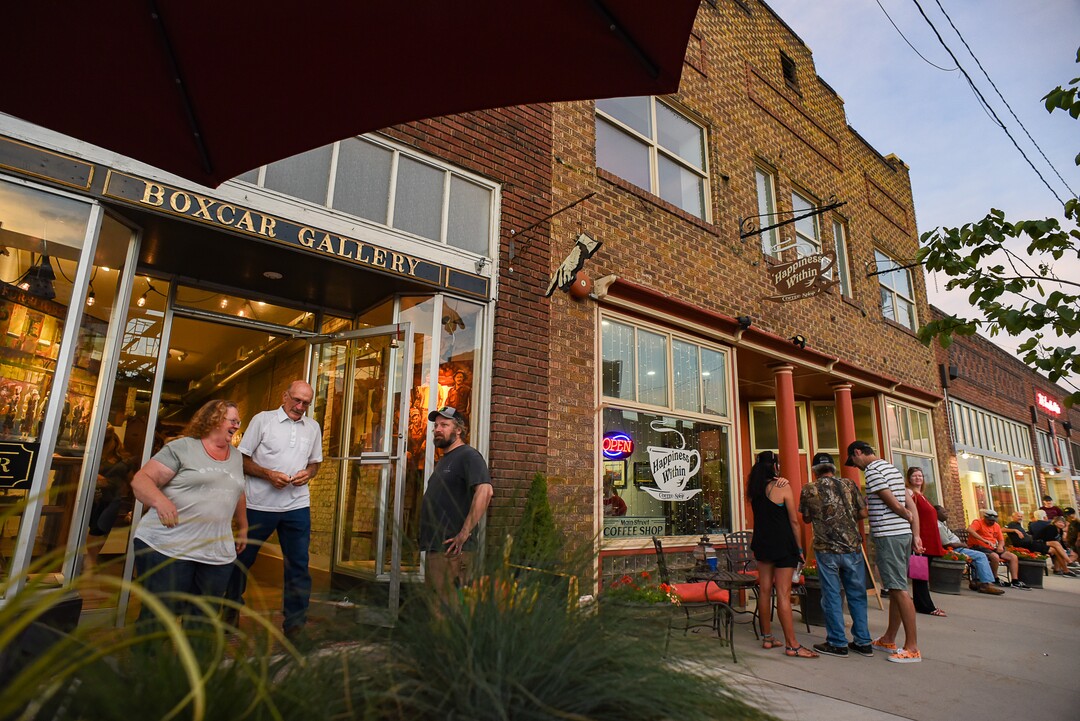 (Francisco Kjolseth  |  The Salt Lake Tribune)  Helper First Fridays draws people to historic Main Street on Friday, Aug. 2, 2019, for their monthly gallery stroll where the small town has been discovered by a variety of artists and dreamers seeking to escape the hustle of the Wasatch Front, lured by cheap real estate prices. Helper today resembles Park City in the late 1960s. Some aging, empty buildings remain, but newcomers joining natives are slowly reinventing the little town of just over 2,000 residents as an artist colony and tourist destination.