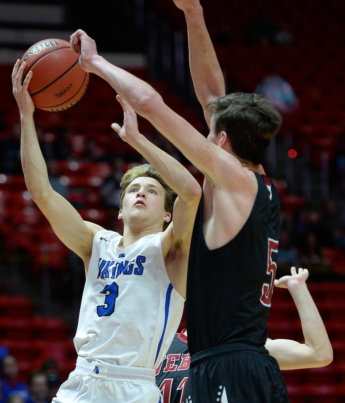 (Francisco Kjolseth  |  The Salt Lake Tribune)  Weber vs Pleasant Grove, 6A State high school basketball tournament at the Huntsman Center in Salt Lake City, Thursday March 1, 2018. Pleasant Grove's Casey Brown (3) tries to push past Weber. 