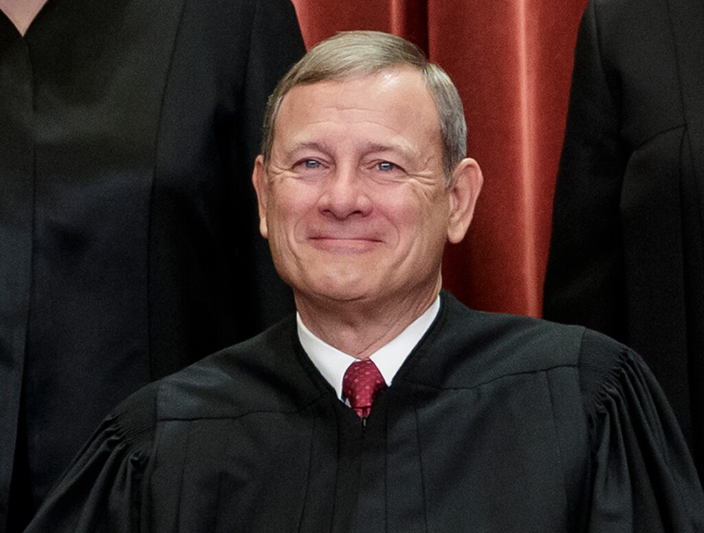 (J. Scott Applewhite | AP Photo) In this Nov. 30, 2018, file photo, Chief Justice of the United States, John Roberts, sits with fellow Supreme Court justices for a group portrait at the Supreme Court Building in Washington.